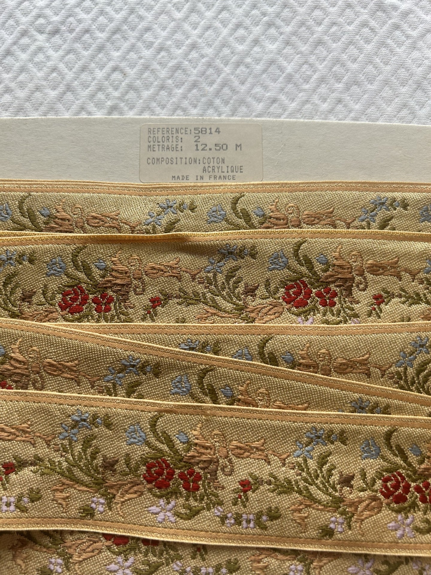 bordo decorato ricamato Lurex floreale , cot. e acrilico, Made in France H.4 CM.